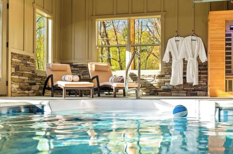 Relaxation Retreat: Soak up mountain views from this serene indoor pool paradise!