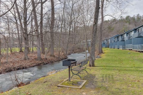 Scenic outdoor picnic area with grill—perfect for casual meals and nature views.