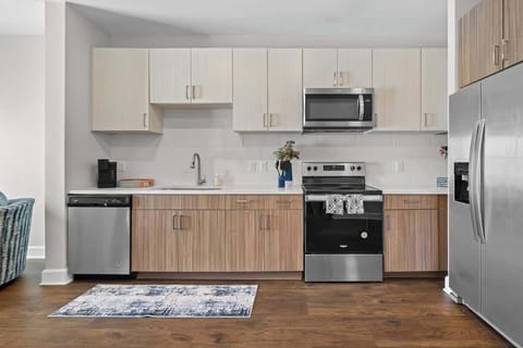 - Fully equipped kitchen with storage  
- Stainless appliances for easy cooking  
- Modern design ideal for long stays  