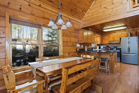 The dining area, just steps away from the kitchen, makes it easy to enjoy meals together in a comfortable, inviting setting.