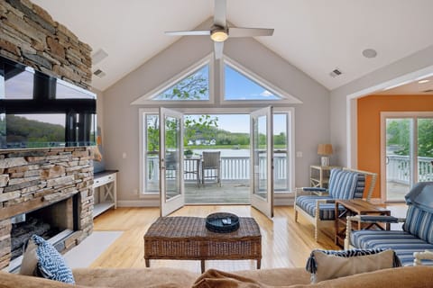 Living Room 1: Natural light meets river sights in our cozy living area!