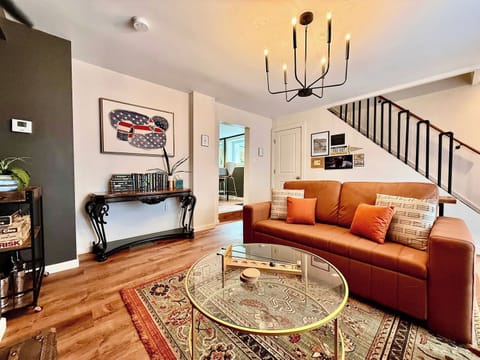 LIVING ROOM | FIRST FLOOR: The living room is just one step down from the kitchen.