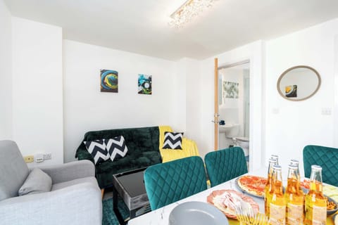 Living and Dining Area | Access to Bathroom with Shower