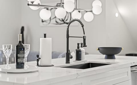 Gather around the cozy kitchen table, perfect for meals and conversations