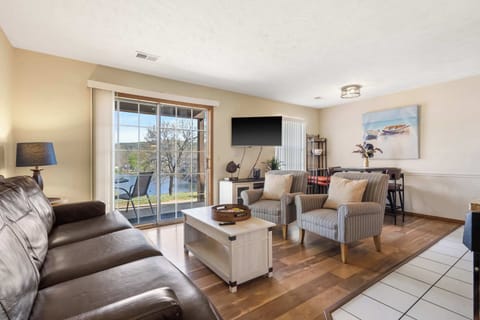 Curl up in the breezy living room & stream your favorites on the smart TV