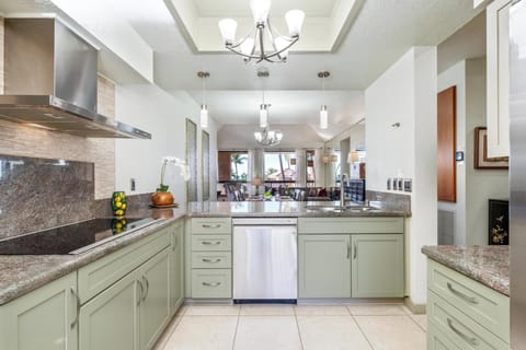 Full kitchen with modern appliances and granite countertops