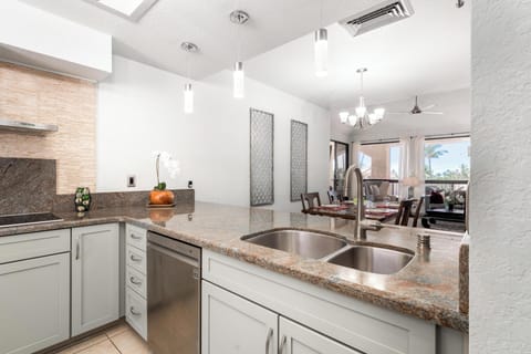 Full kitchen with modern appliances and granite countertops