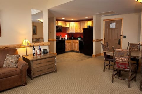 Relax in the charming and beautiful open-concept living space after a long day out exploring the slopes