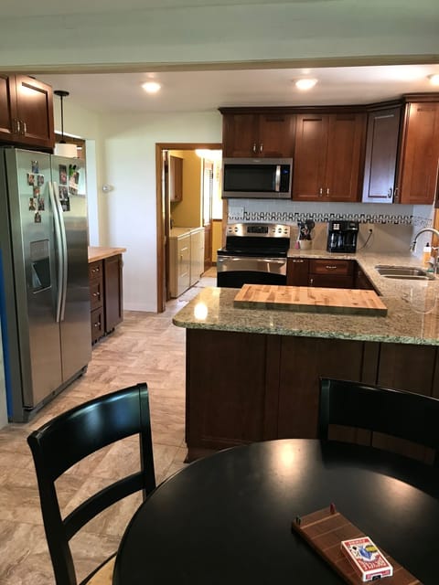 Modern kitchen with laundry in the back area