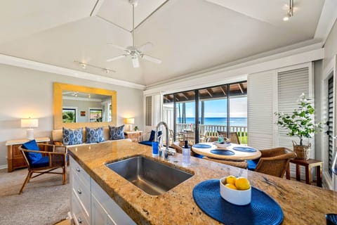 Step into paradise with this stunning oceanfront view! This beautifully designed kitchen seamlessly 