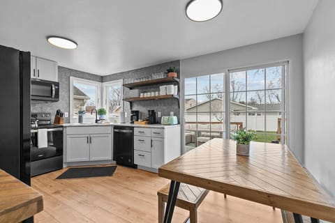 Enjoy bright mornings and sunset dinners with deck views from the dining area.