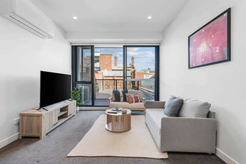 Cozy living room with large smart TV 