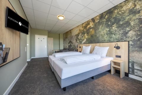 Unit with Twin beds. Exact unit will be assigned upon arrival. Views, colors, and decor may vary.