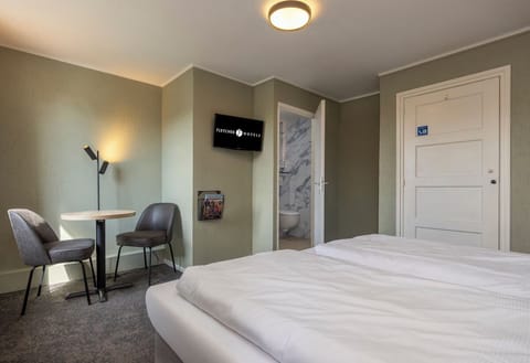 Unit with 2 Single beds. Exact unit will be assigned upon arrival. Views, colors, and decor may vary.