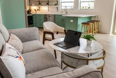 Coffee table lifts up for use as a workstation (laptop not included).