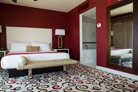 Drift off in a serene bedroom with thoughtful modern touches.