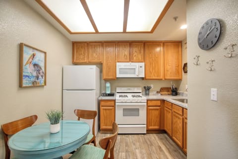 Start your day right — fresh coffee and a sunny kitchen await.