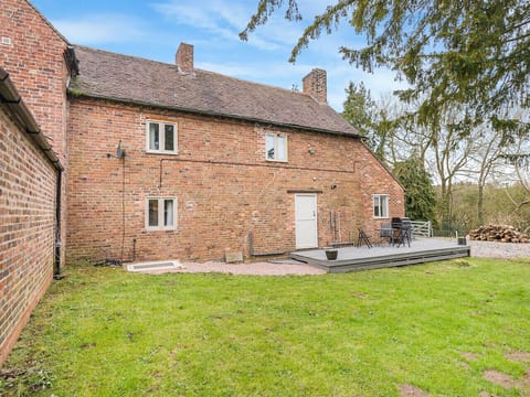 Private garden with decking and BBQ