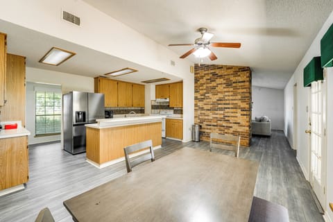 Kitchen & Dining Area | In-Unit Laundry | Central Heating & A/C