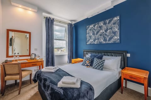 Sink into plush bedding and enjoy a peaceful night’s sleep.
