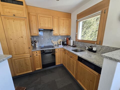 Kitchen, Countertop, Cabinetry, Kitchen Appliance, Flooring, Major Appliance, Wood, Furniture, Floor, Interior Design