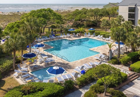 Enjoy the Shipwatch Villas community pool and stunning views from your living room and balcony