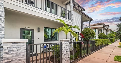 A modern exterior with clean architectural lines, expansive windows