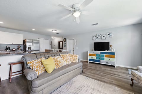 Curl up in the airy living room & stream your favorites on the smart TV