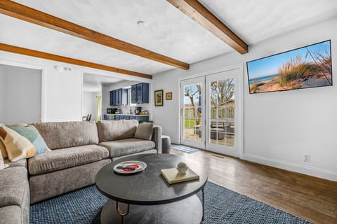 Natural light, soothing vibes, and easy French door access to the backyard.