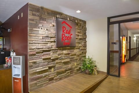 Step into a warm lobby with welcoming stone accents.