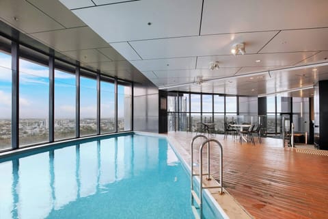 A shared pool with sweeping city views—perfect for a refreshing swim or a quiet moment of relaxation high above Brisbane’s skyline.