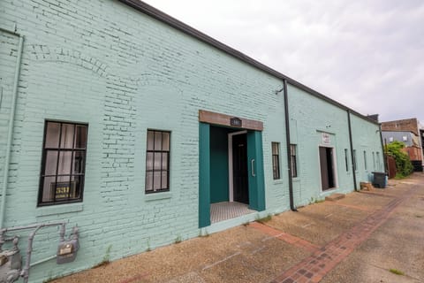 Convenient back entrance just steps from the parking lot — easy access for unloading and coming & going during your stay.