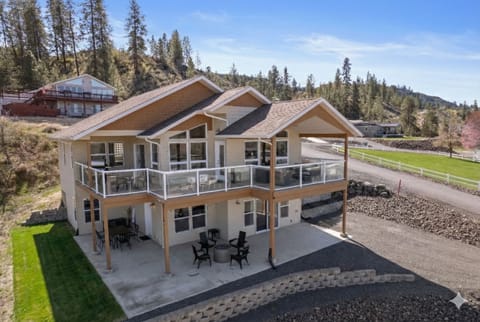 Expansive windows fill the space with natural light and stunning views