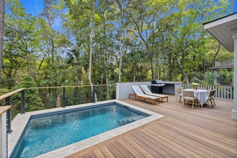 Enjoy the beautiful Kiawah ambiance from the pool and back deck
