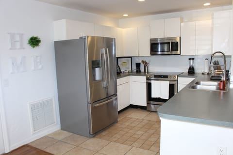 Cook like home in this fully stocked kitchen space