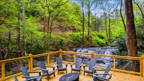 Take in the sights and sounds of your very own waterfall from the expansive deck