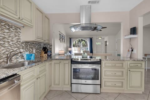 Well-equipped kitchen looks out to the living space
