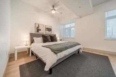 The bedroom’s serene ambiance invites you to relax, with a plush bed that promises a restful night`s sleep.