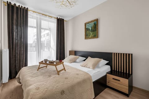First Bedroom with Queen Bed | Book Now with RENTUJEMY.COM