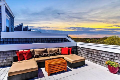 Take in sweeping views of town and the harbor from your private rooftop oasis.