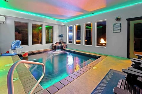 Private Indoor Pool Retreat – Enjoy a peaceful swim anytime in your own heated pool, complete with ambient lighting and fire feature views.
