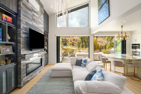 Thoughtfully planned high windows create massive light in the living space.