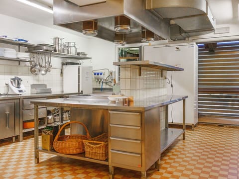 Kitchen, Countertop, Furniture, Flooring, Interior Design, Cabinetry, Kitchen Appliance, Lighting, Ceiling, Light Fixture