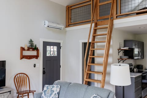 [Living Space] Handmade Alder ladder into sleeping loft.