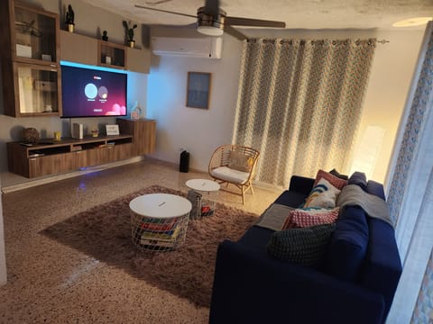 Enjoy the living room with your family and friends watching TV.