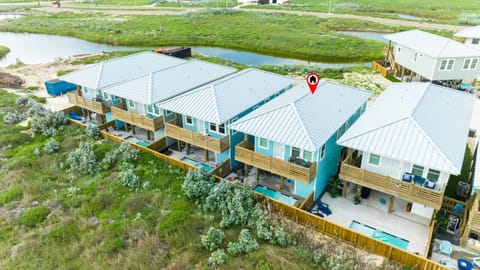 Bird’s-eye view of your beach escape — steps from the sand and surrounded by coastal charm.