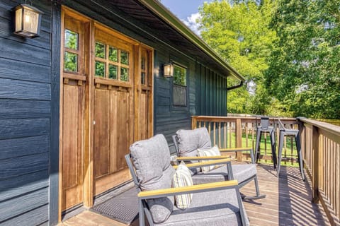 Welcome to your Smoky Mountain escape! Rock away the day on modern chairs and soak in stunning sunsets right from the front porch.