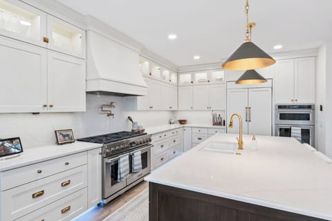 Spacious gourmet kitchen with stainless steel appliances and luxe finishes.