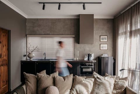 A well equip kitchen with induction cook top, oven and microwave, Nespresso machine and cooking basics.
