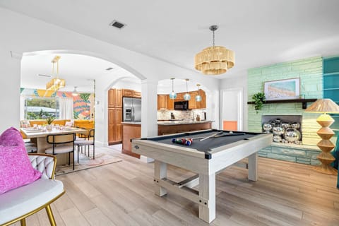 Embrace the spaciousness of this open floor plan, where the living, dining, and kitchen areas flow effortlessly together. 